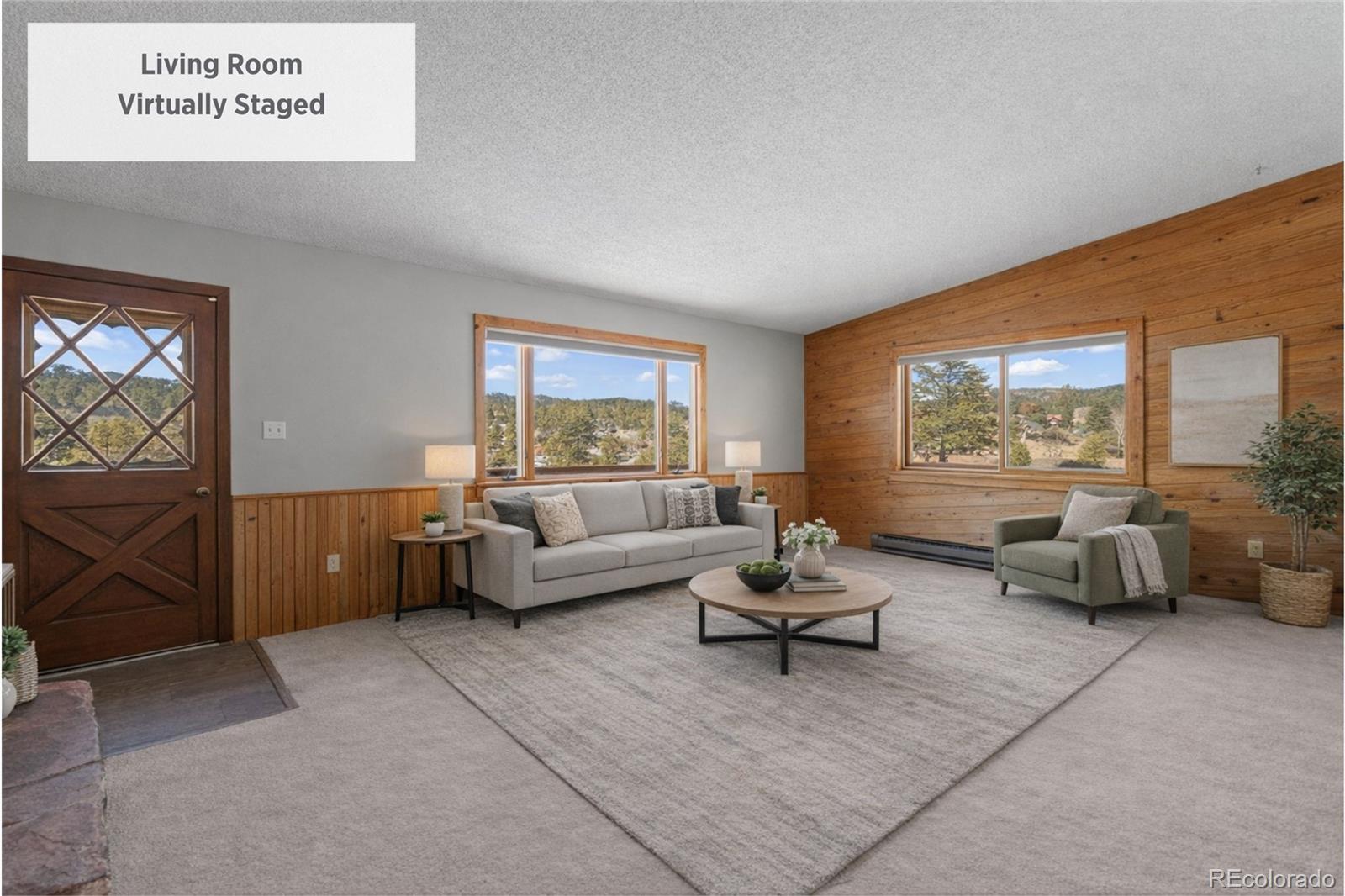 237 Homestead Road Bailey, CO 80421 - Photo 11 of 43 a living room with furniture and a large window