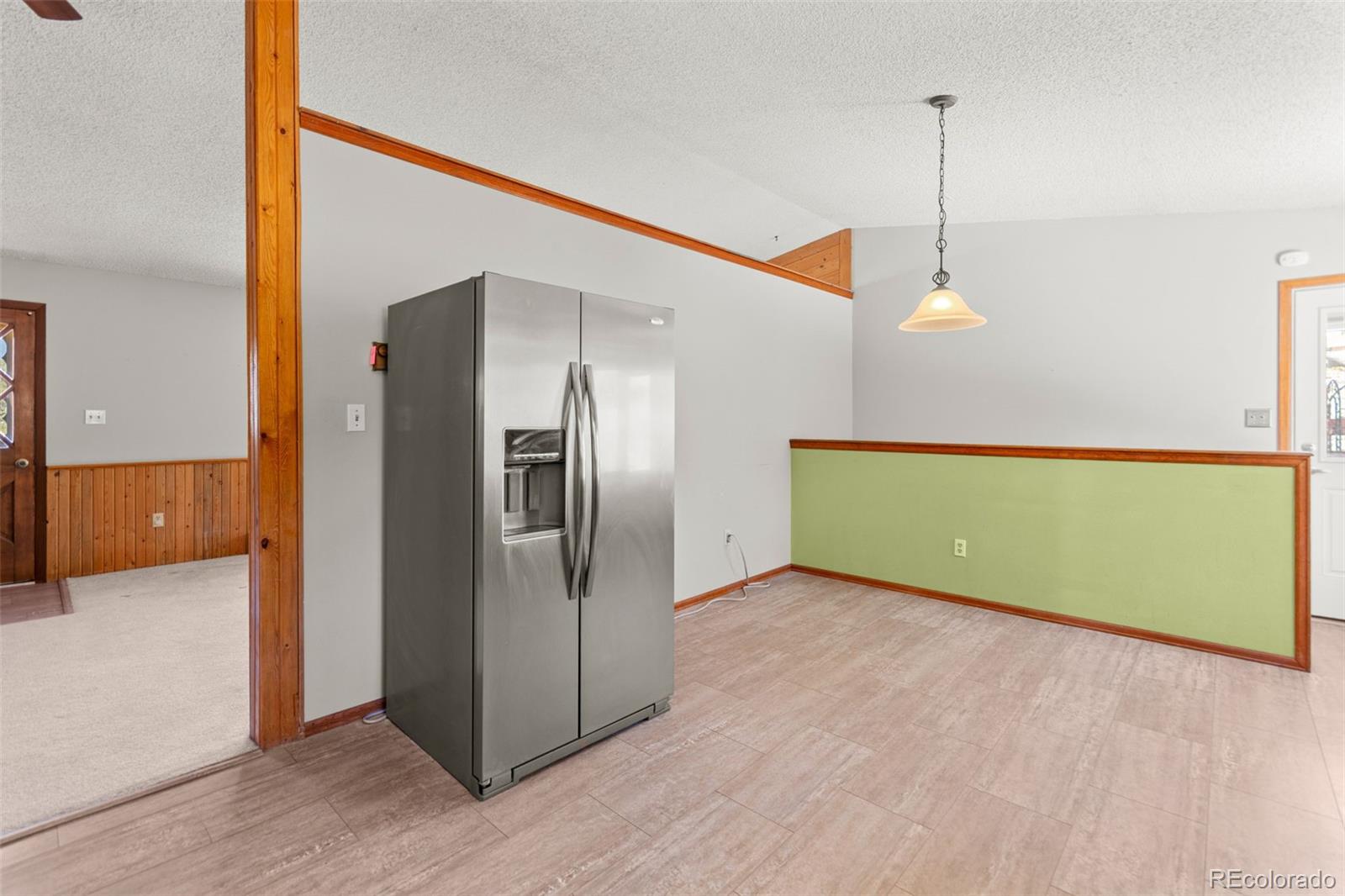 237 Homestead Road Bailey, CO 80421 - Photo 17 of 43 a view of an empty room with a fan