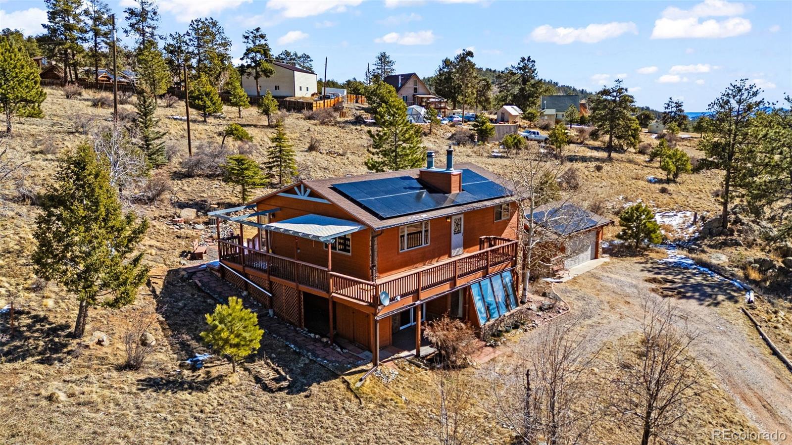 237 Homestead Road Bailey, CO 80421 - Photo 2 of 43 an aerial view of a house with a yard
