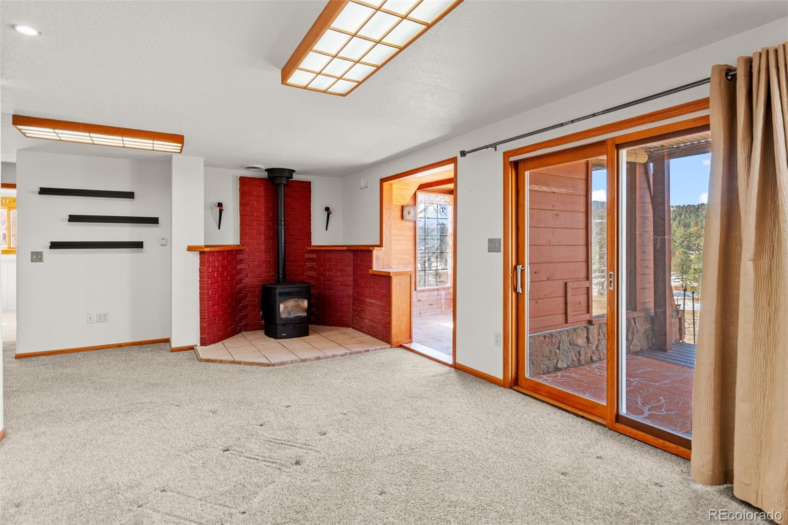 237 Homestead Road Bailey, CO 80421 - Photo 25 of 43 a view of an empty room with a window