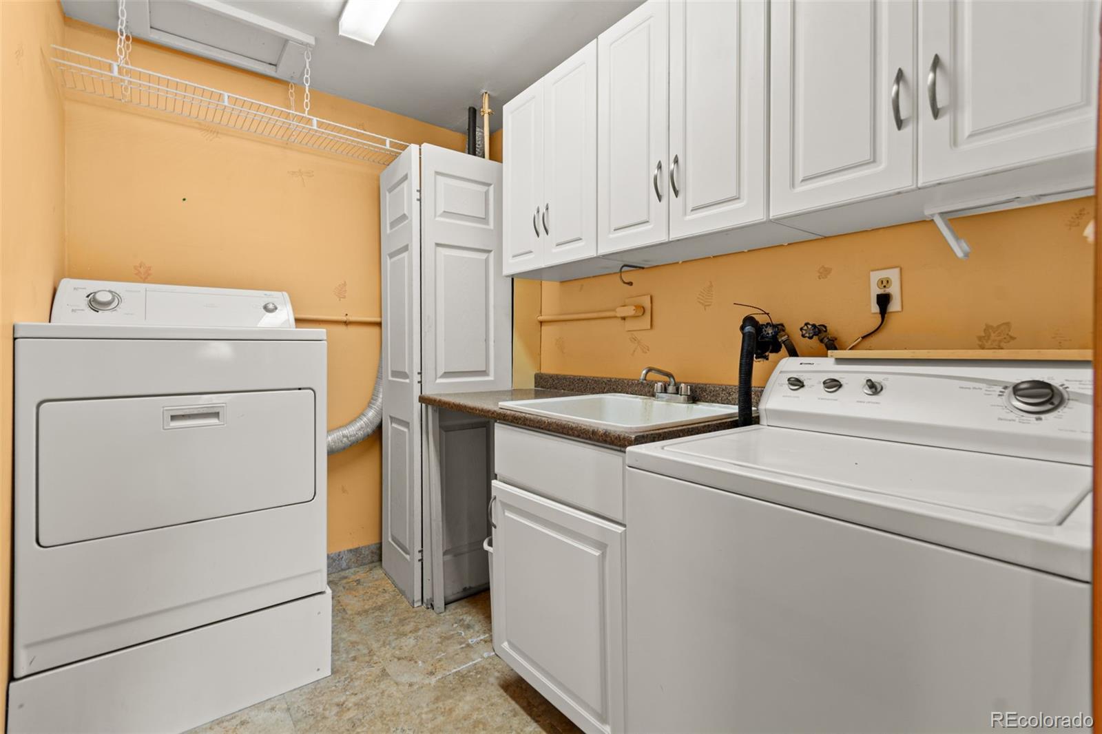 237 Homestead Road Bailey, CO 80421 - Photo 33 of 43 a utility room with dryer and washer