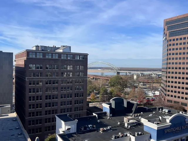 a view of a balcony with city view