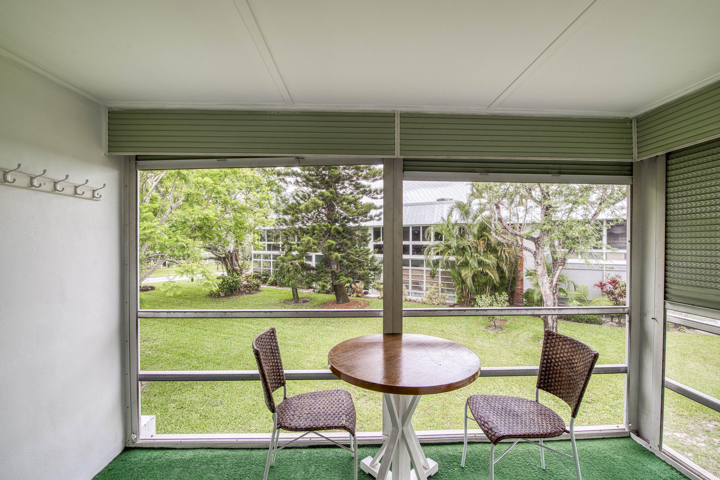 2929 Southeast Ocean Boulevard, Unit 1146 Stuart, FL 34996 - Photo 16 of 19 a view of a chairs and table in a room