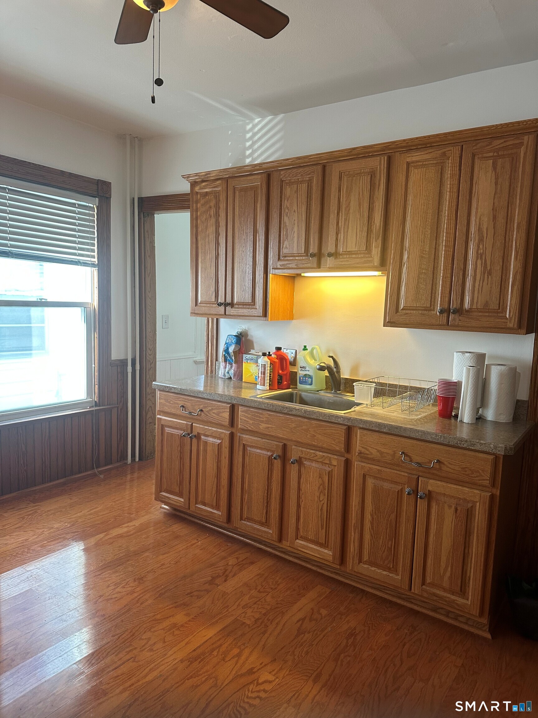 35 Tilton Street New Haven, CT 06511 - Photo 9 of 36 a kitchen with granite countertop wooden cabinets a sink and appliances