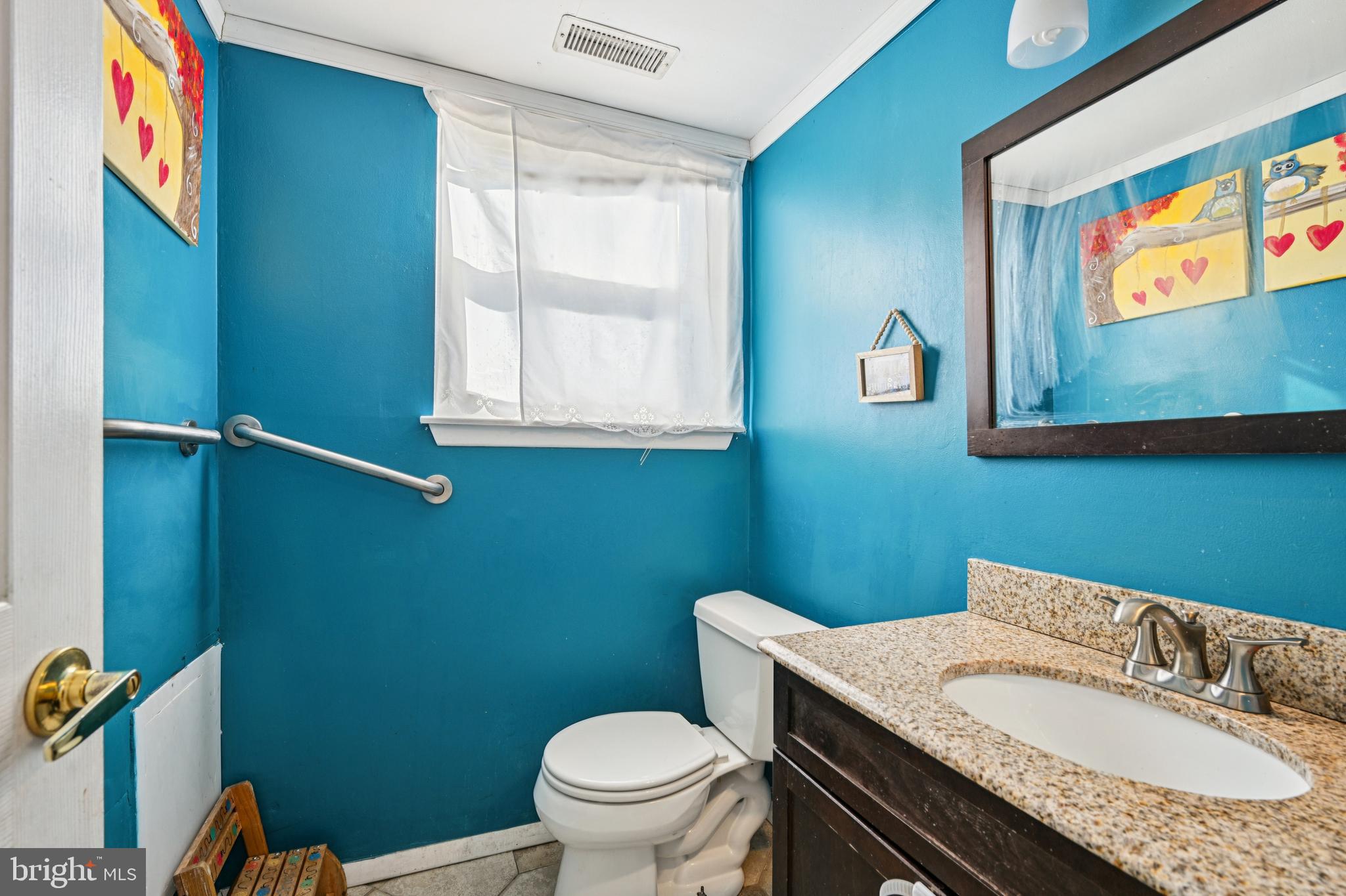 135 Windward Drive Barnegat, NJ 08005 - Photo 14 of 55 a bathroom with a granite countertop toilet sink and mirror