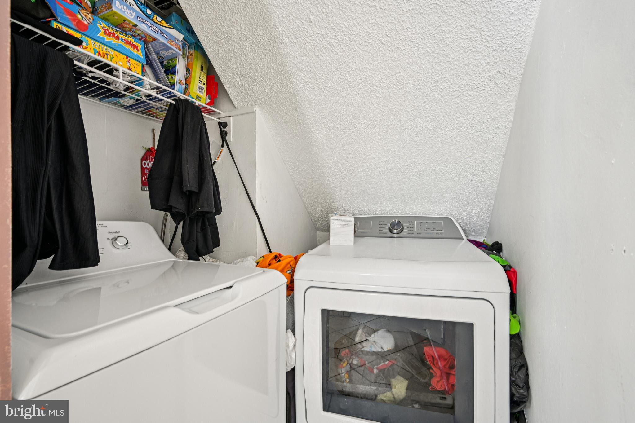 135 Windward Drive Barnegat, NJ 08005 - Photo 16 of 55 a utility room with dryer and washer