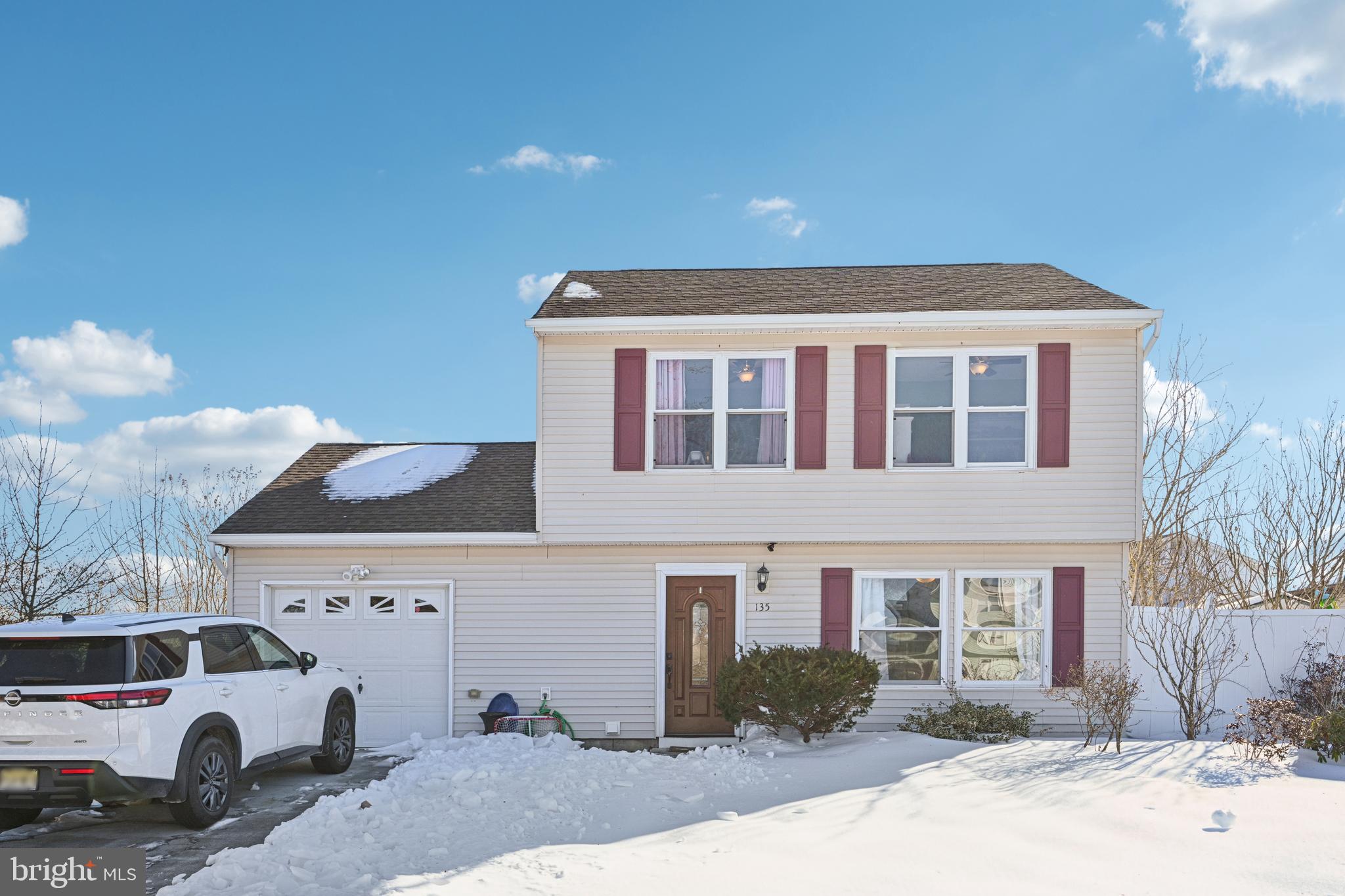 135 Windward Drive Barnegat, NJ 08005 - Photo 2 of 55 a front view of a house with a yard