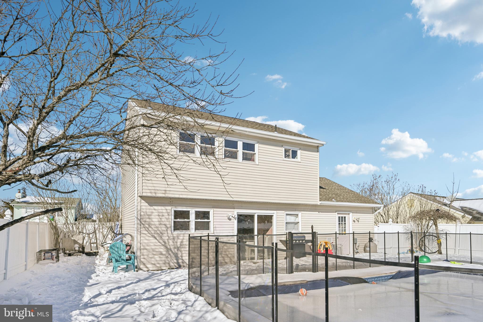 135 Windward Drive Barnegat, NJ 08005 - Photo 28 of 55 a view of a house with wooden fence