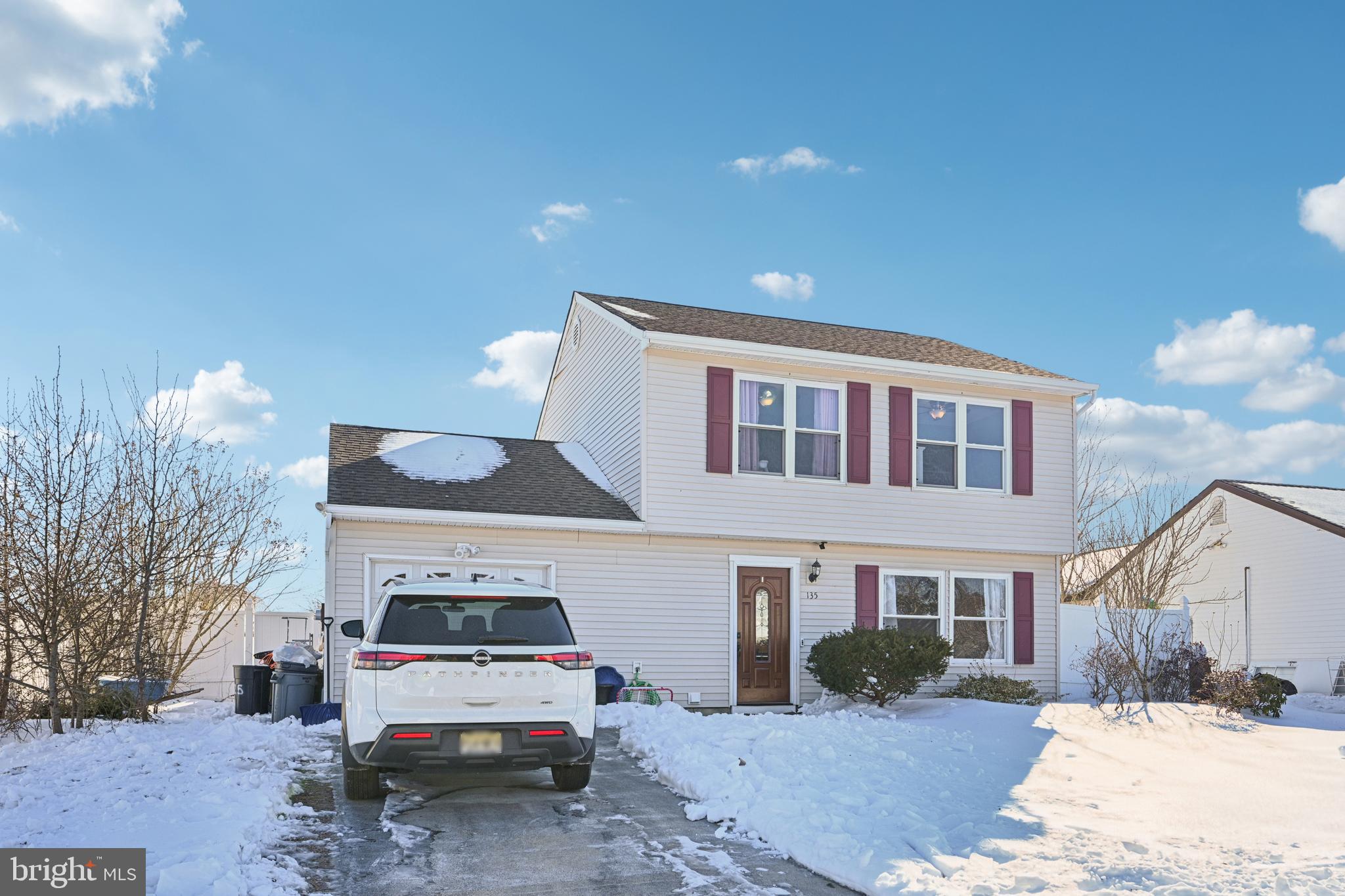 135 Windward Drive Barnegat, NJ 08005 - Photo 3 of 55 a view of a car park in front of house