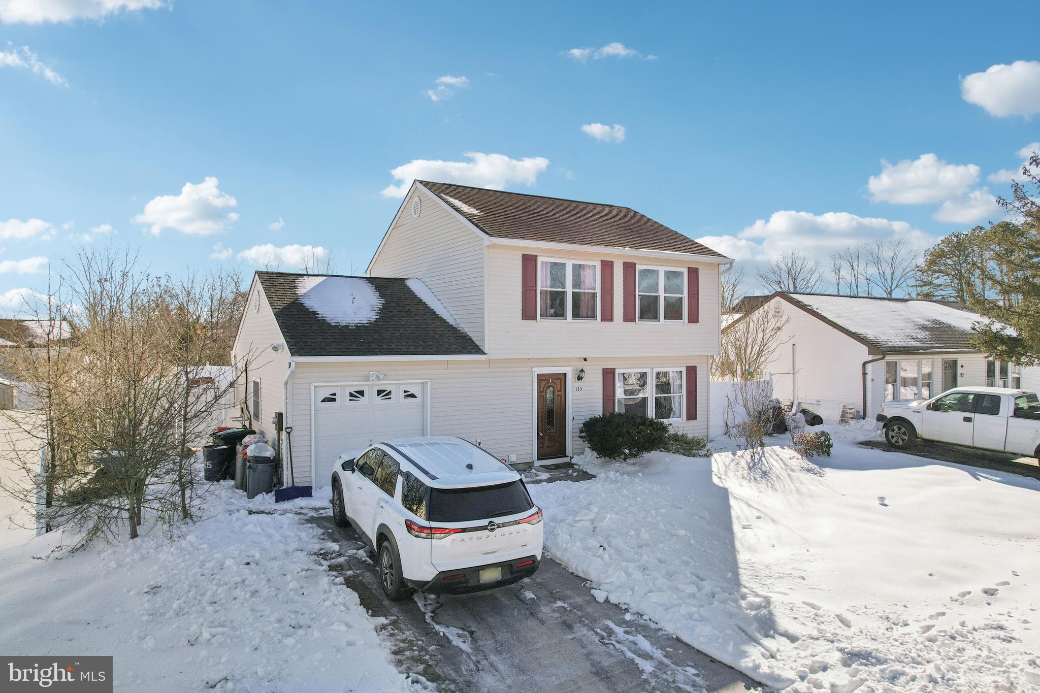135 Windward Drive Barnegat, NJ 08005 - Photo 34 of 55 a front view of a house with a yard