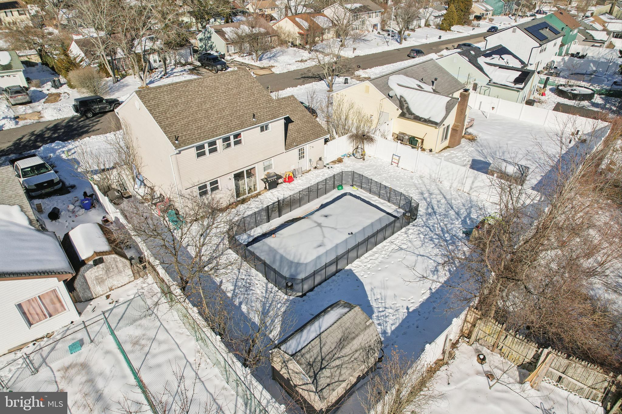 135 Windward Drive Barnegat, NJ 08005 - Photo 38 of 55 an aerial view of a residential apartment building with a yard