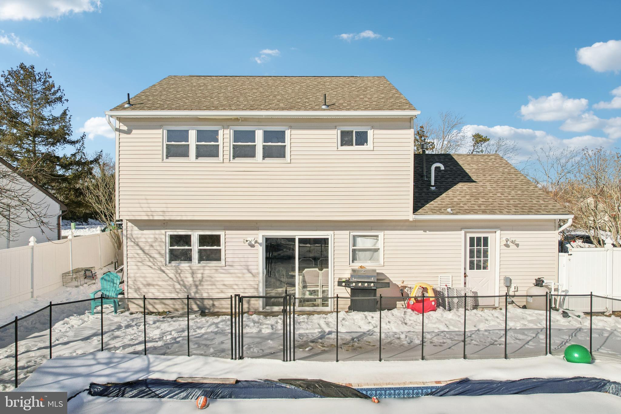 135 Windward Drive Barnegat, NJ 08005 - Photo 51 of 55 a front view of a house with a garden