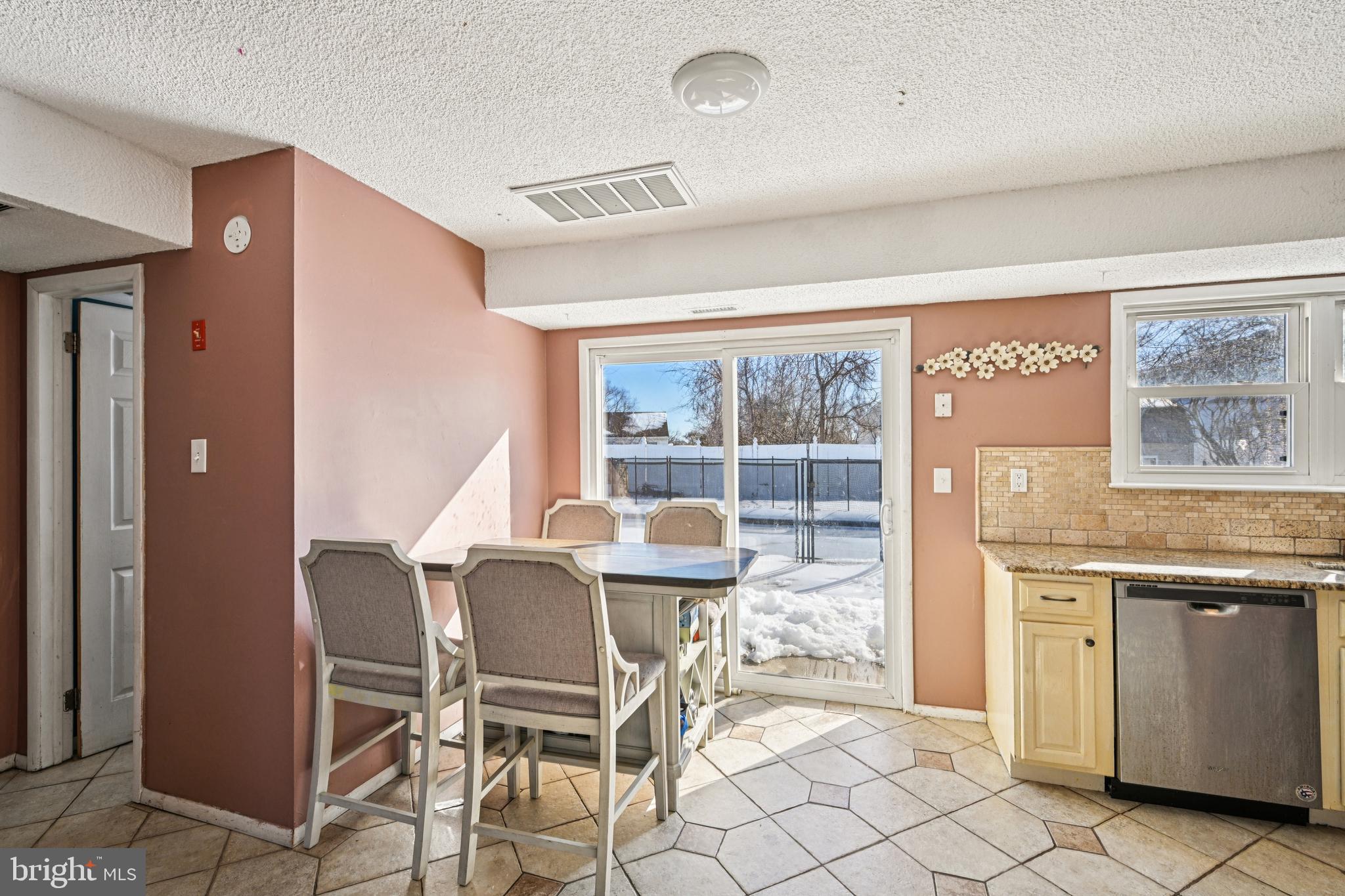135 Windward Drive Barnegat, NJ 08005 - Photo 9 of 55 a dining room with furniture and window