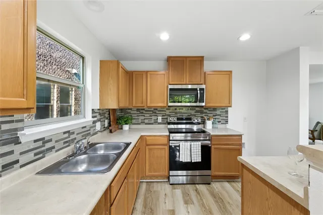 a bed room with furniture and a potted plant
