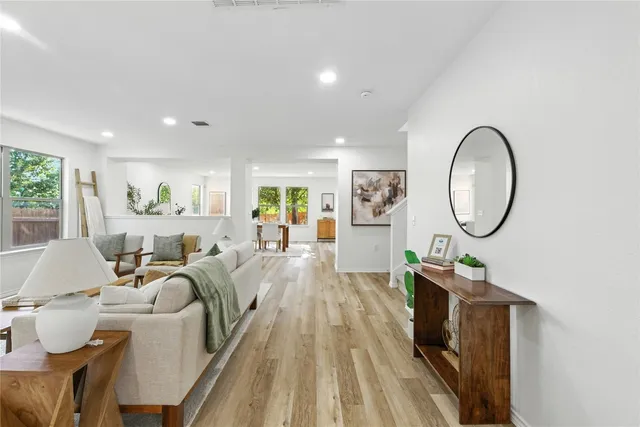 a bathroom with a toilet a sink and bathtub