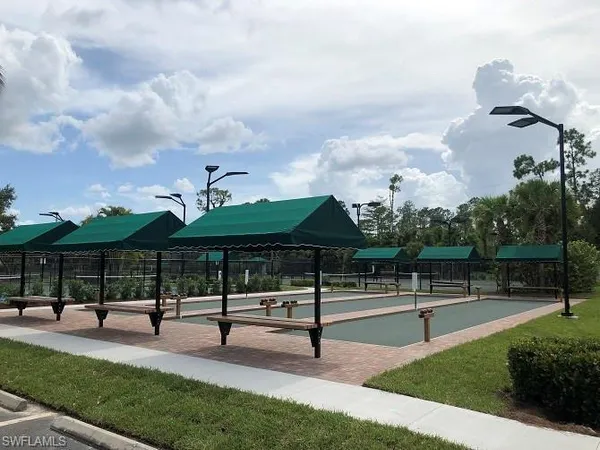 a view of a park with sitting area