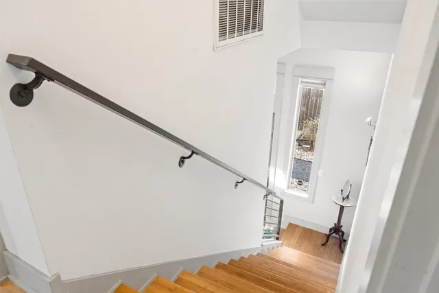 a view of entryway with wooden floor