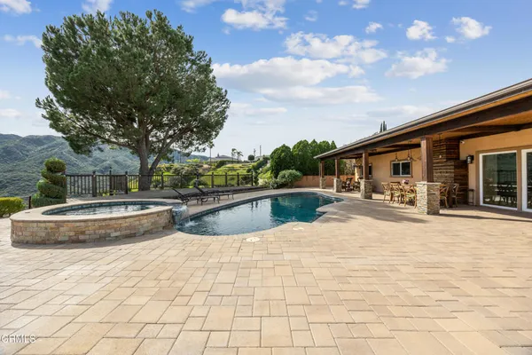 a view of a house with entertaining space
