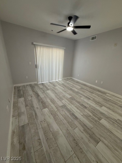 6955 North Durango Drive, Unit 1013 Las Vegas, NV 89149 - Photo 2 of 13 Spare room featuring a ceiling fan