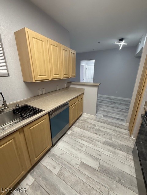 6955 North Durango Drive, Unit 1013 Las Vegas, NV 89149 - Photo 7 of 13 Kitchen with dishwashing machine, light brown cabinetry, light countertops, and stove