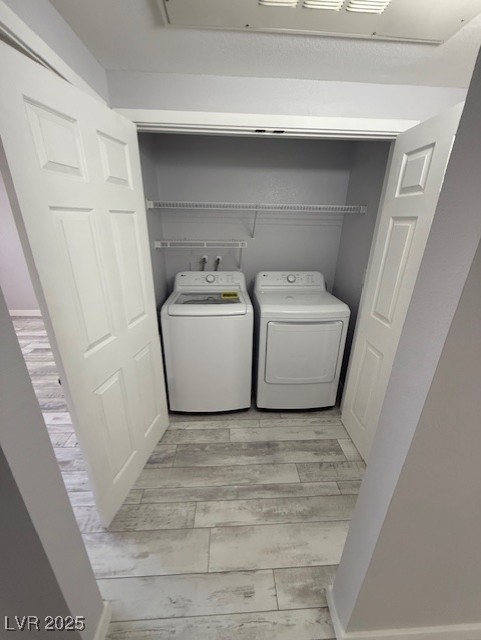 6955 North Durango Drive, Unit 1013 Las Vegas, NV 89149 - Photo 8 of 13 Laundry area featuring washing machine and dryer