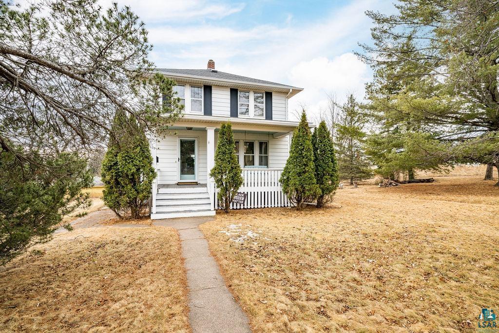 4608 Regent Street Duluth, MN 55804 - Photo 1 of 43 American foursquare style home with covered porch and a chimney