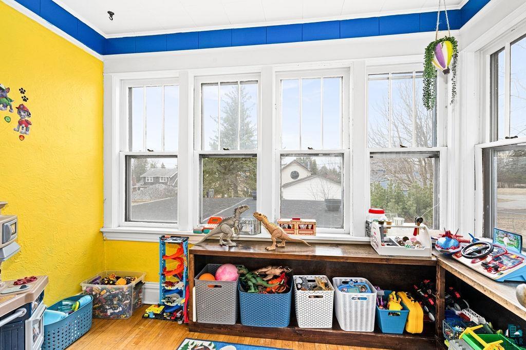 4608 Regent Street Duluth, MN 55804 - Photo 16 of 43 Recreation room with a textured wall and wood finished floors