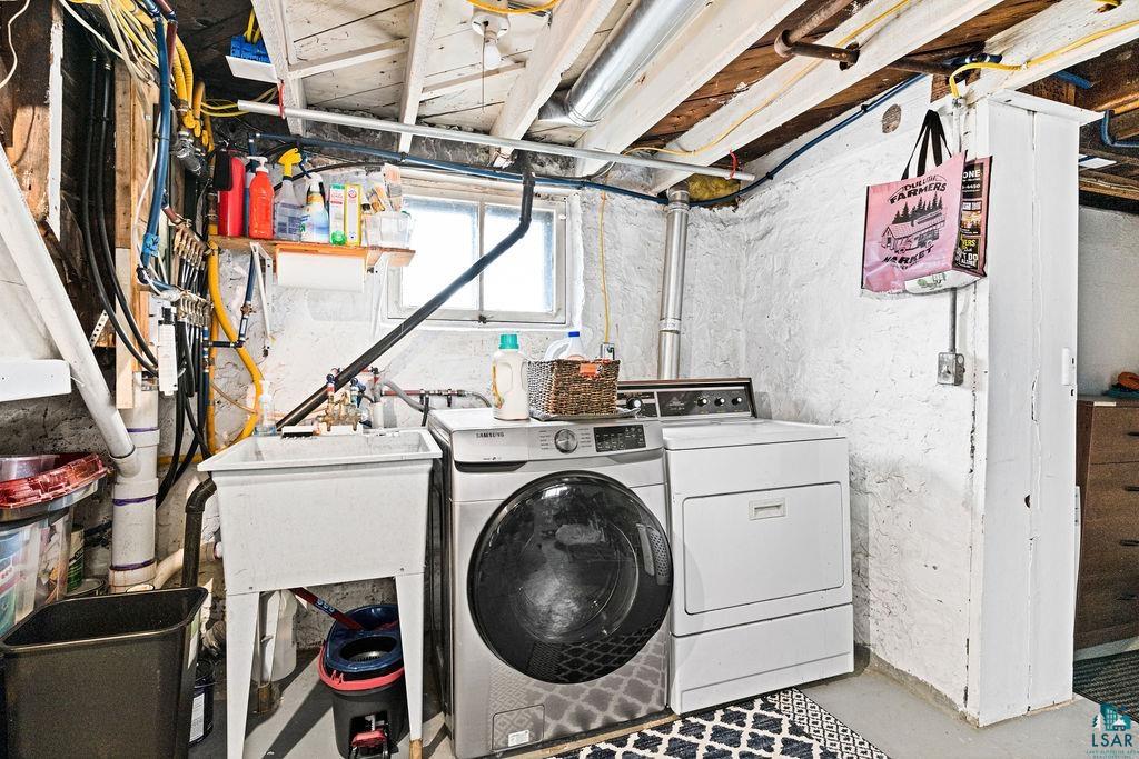 4608 Regent Street Duluth, MN 55804 - Photo 32 of 43 Laundry room featuring laundry area and washing machine and dryer