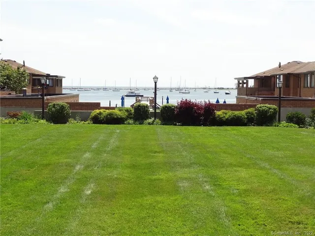 a view of a golf course with a lake