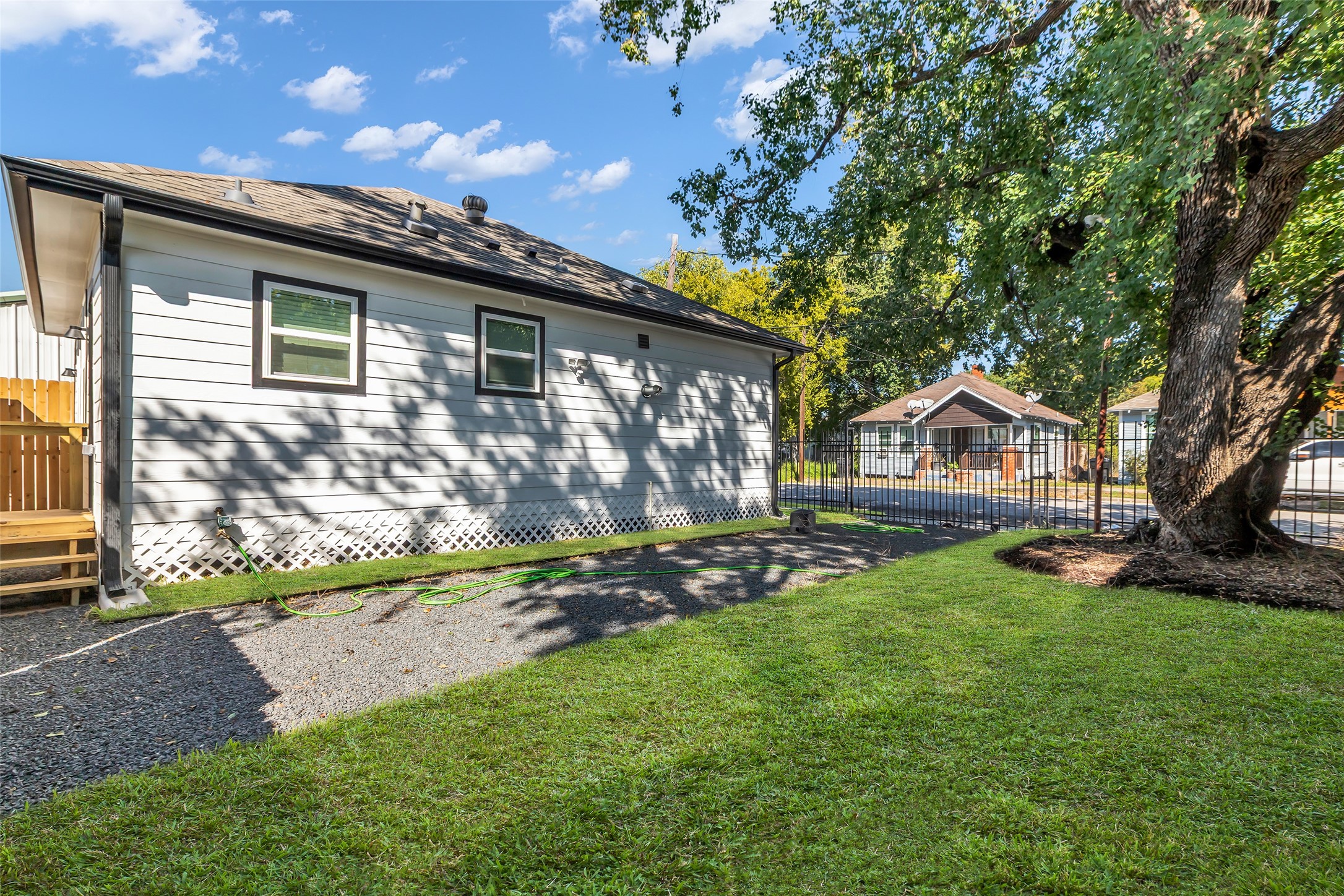 3440 Bremond Street Houston, TX 77004 - Photo 25 of 26 a front view of house with yard and green space