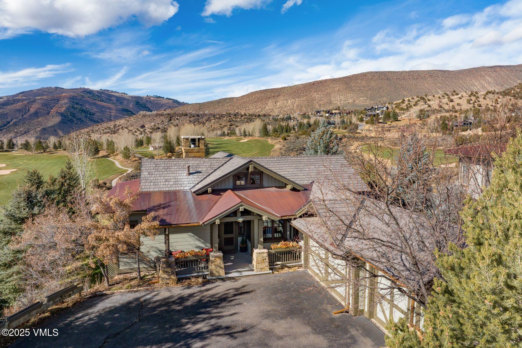 33 Legends Court Edwards, CO 81632 - Photo 11 of 50 an aerial view of a house with a mountain in the background