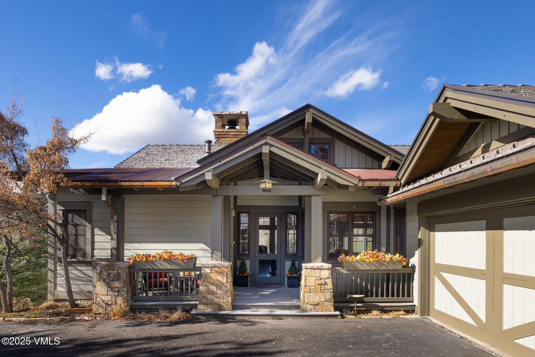 33 Legends Court Edwards, CO 81632 - Photo 12 of 50 a front view of a house with yard