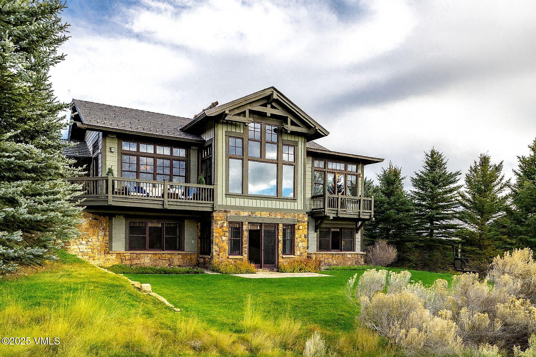 33 Legends Court Edwards, CO 81632 - Photo 14 of 50 a front view of a house with garden