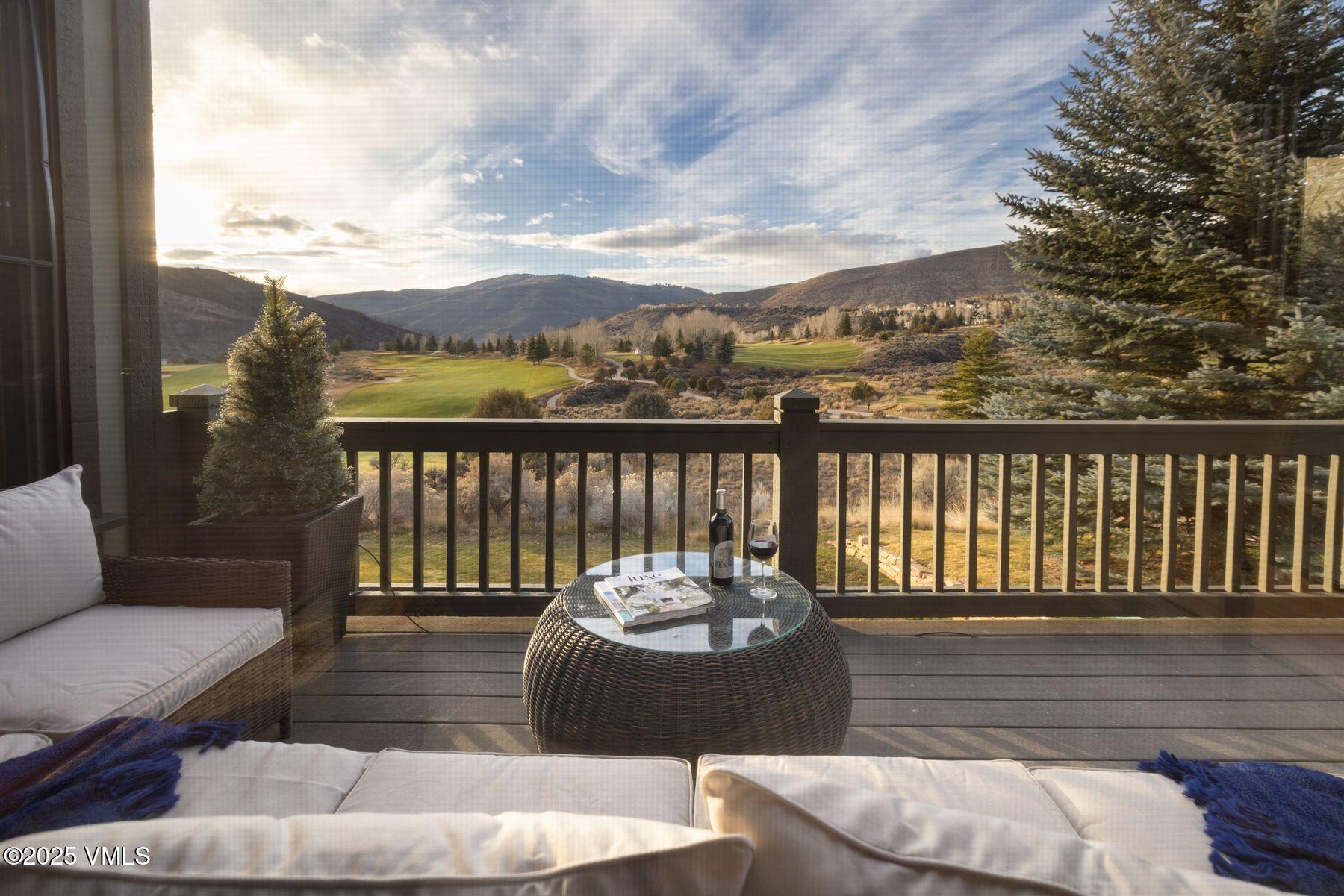 33 Legends Court Edwards, CO 81632 - Photo 15 of 50 a view of a balcony with two couches and a potted plant