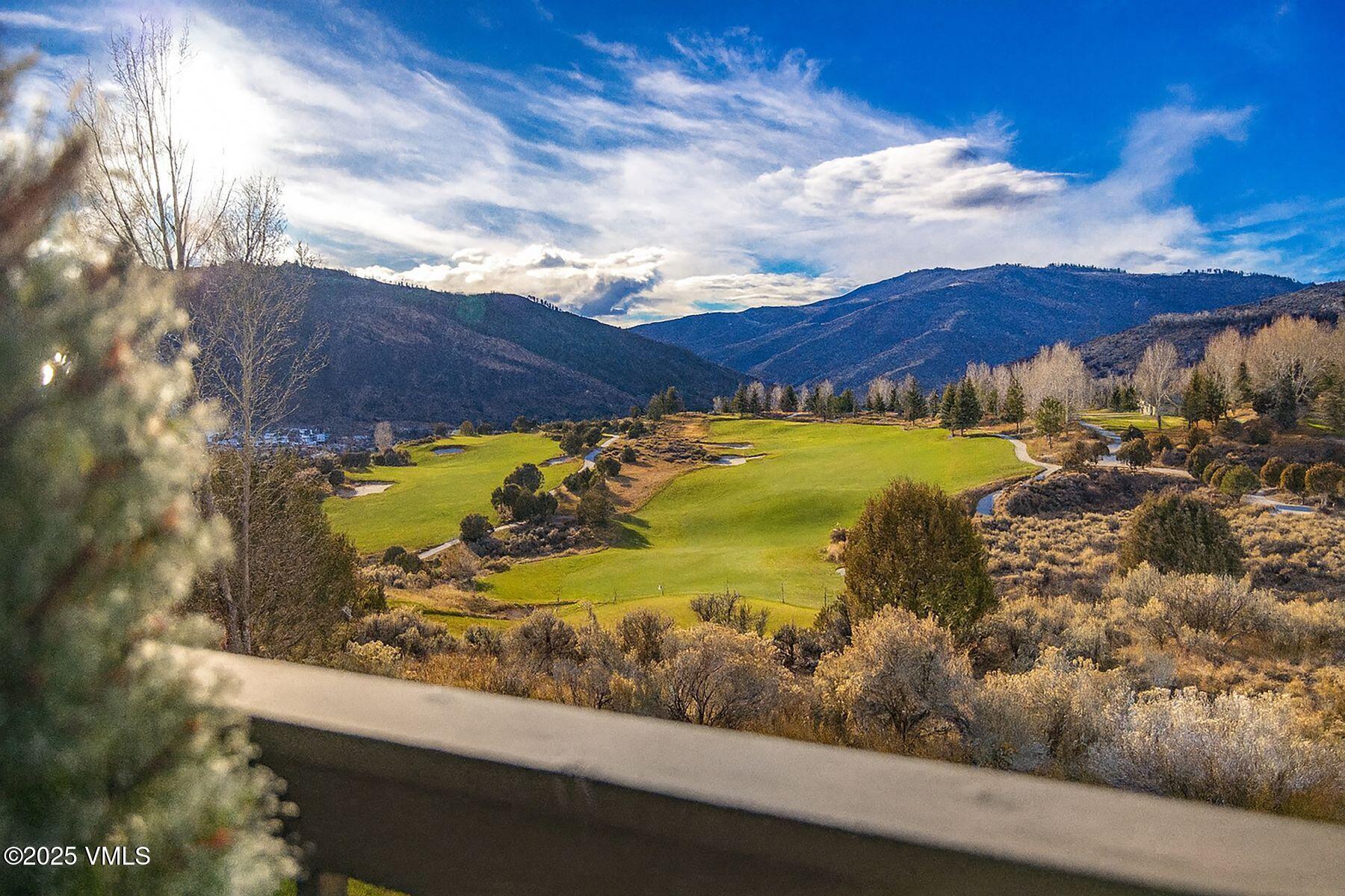 33 Legends Court Edwards, CO 81632 - Photo 16 of 50 a view of a lake with a mountain
