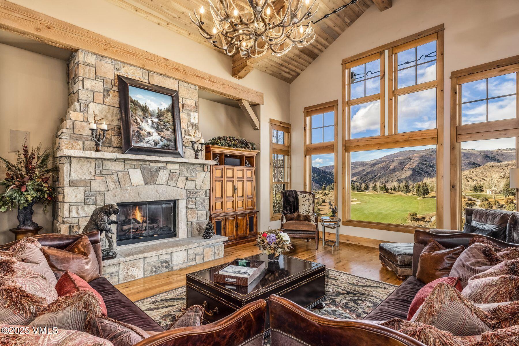 33 Legends Court Edwards, CO 81632 - Photo 17 of 50 a living room with furniture fireplace and a large window