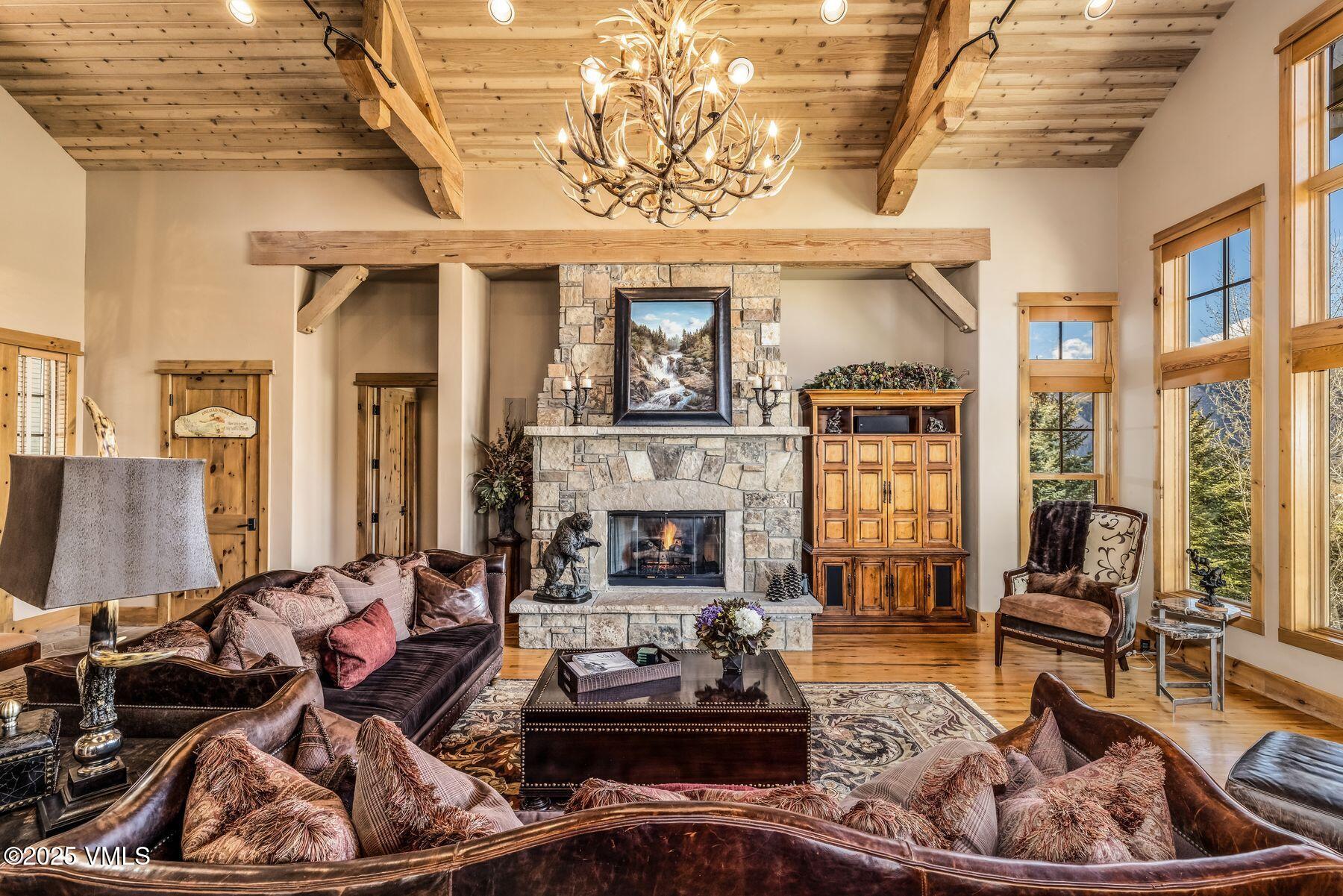 33 Legends Court Edwards, CO 81632 - Photo 18 of 50 a living room with furniture and a fireplace