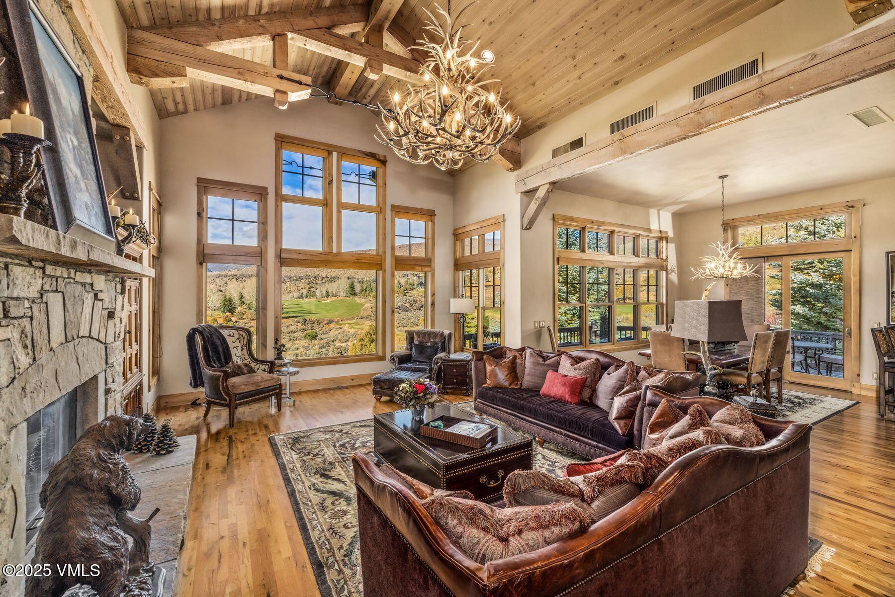 33 Legends Court Edwards, CO 81632 - Photo 19 of 50 a living room with fireplace furniture and a large window
