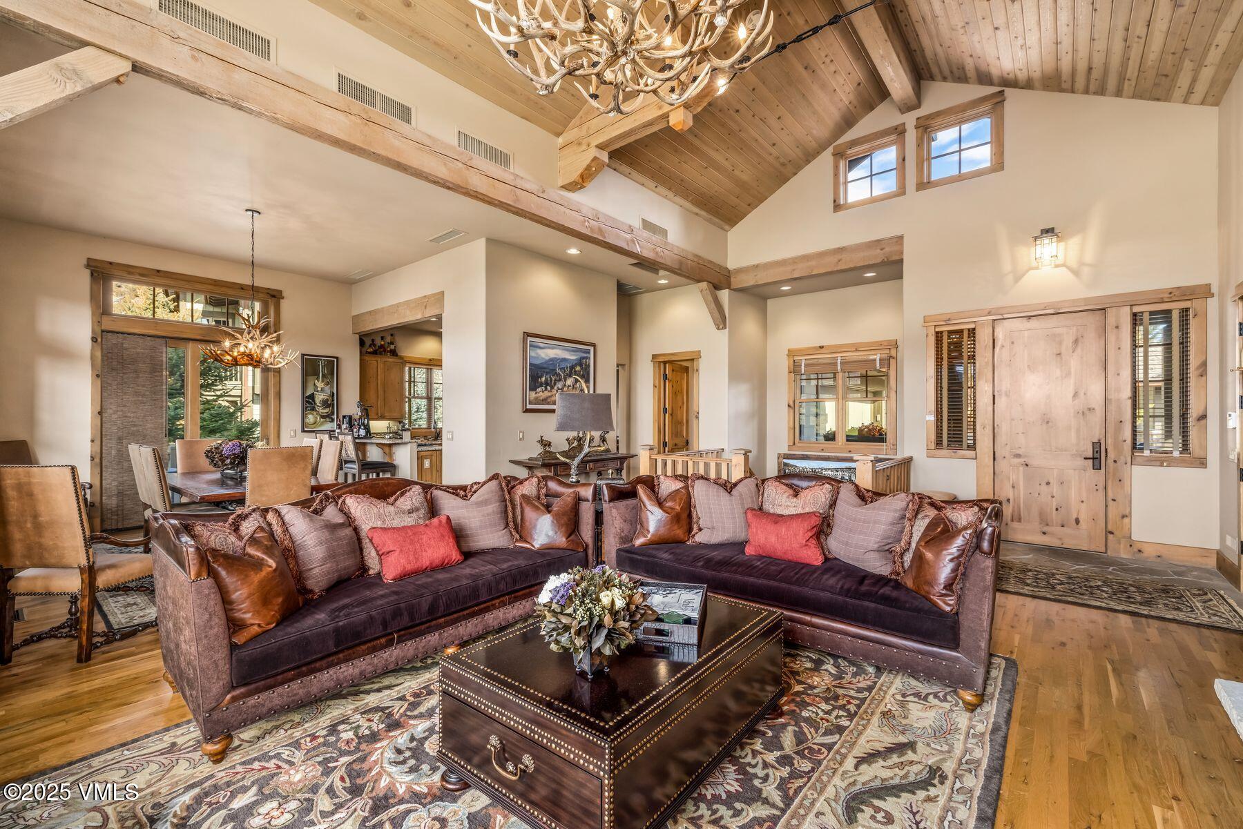 33 Legends Court Edwards, CO 81632 - Photo 20 of 50 a living room with furniture and wooden floor