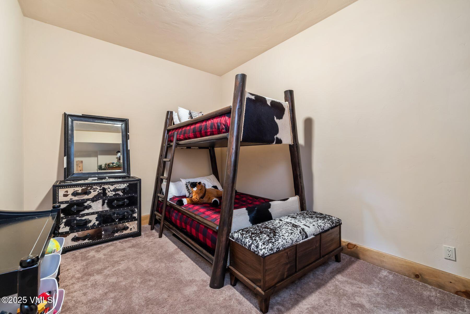 33 Legends Court Edwards, CO 81632 - Photo 38 of 50 a bedroom with bed and a window