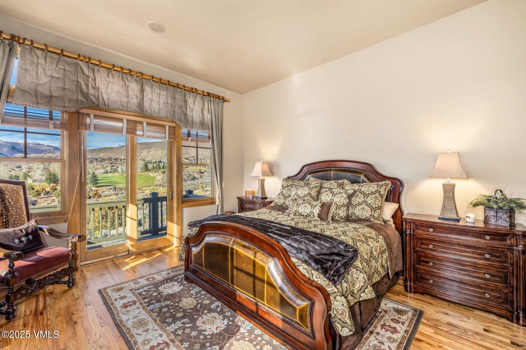 33 Legends Court Edwards, CO 81632 - Photo 8 of 50 a bedroom with a large bed and a window