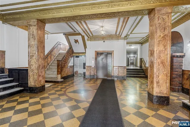a bathroom with a sink a vanity and a mirror