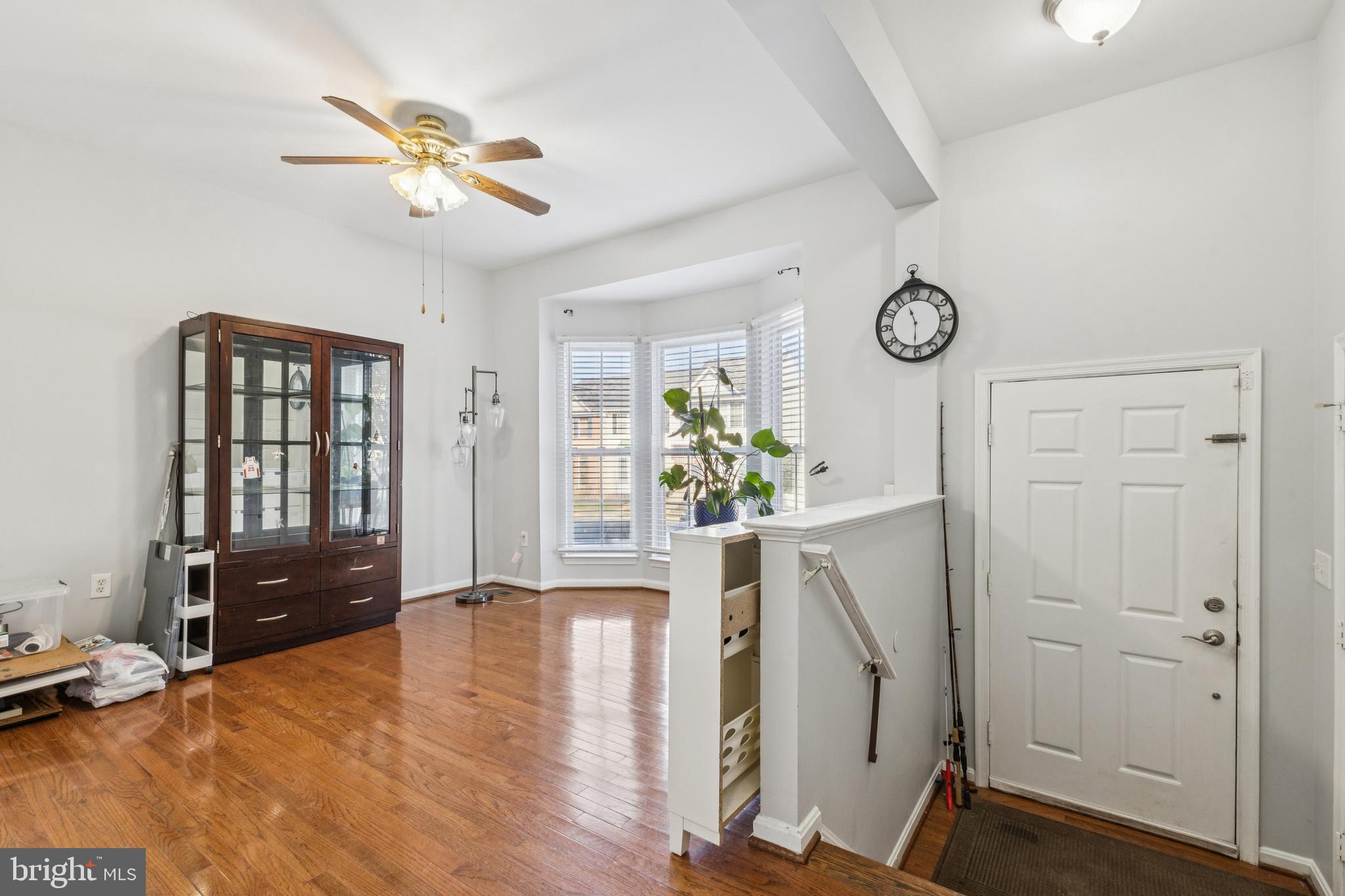 43067 Candlewick Square Leesburg, VA 20176 - Photo 3 of 25 a view of an entryway with wooden floor