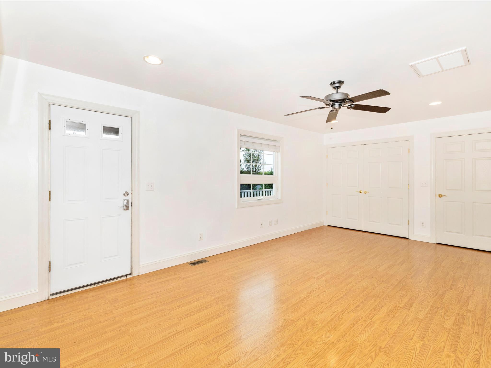 8429 Woodville Road Mount Airy, MD 21771 - Photo 22 of 75 a view of an empty room with a window