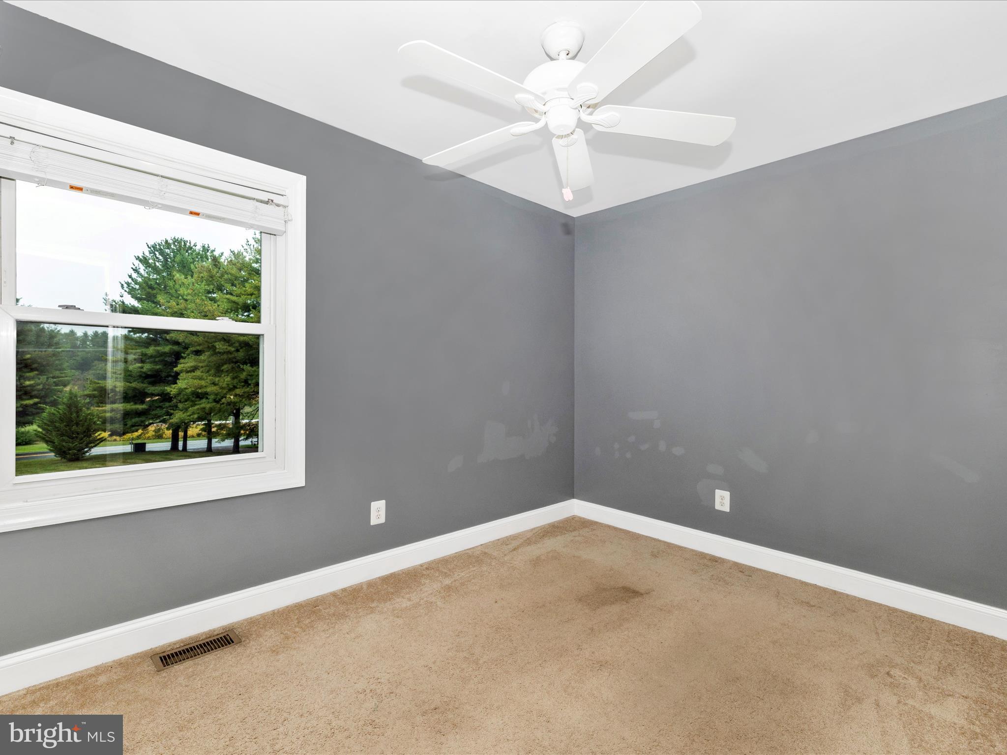 8429 Woodville Road Mount Airy, MD 21771 - Photo 29 of 75 an empty room with a window