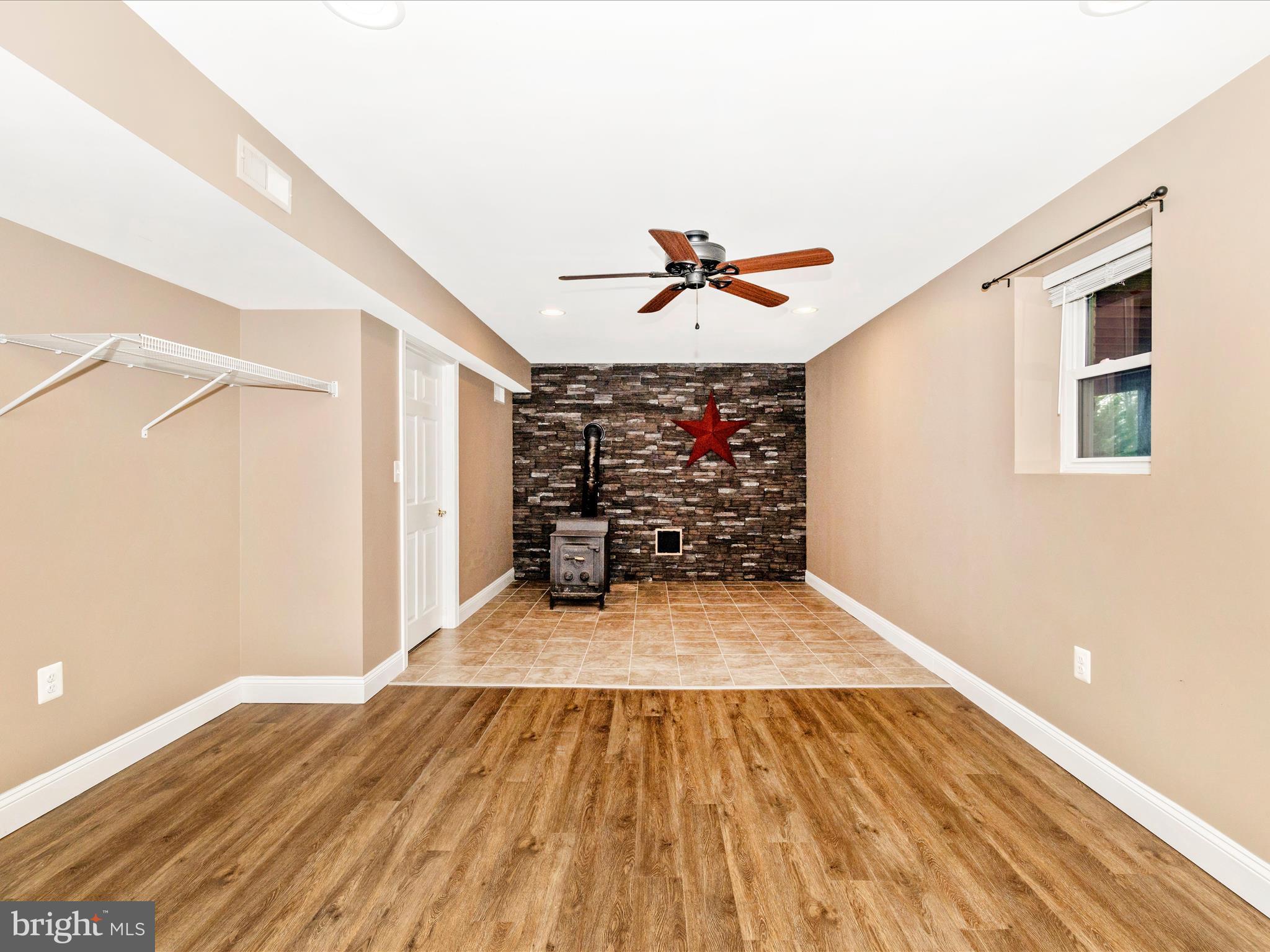 8429 Woodville Road Mount Airy, MD 21771 - Photo 35 of 75 a view of entryway with wooden floor