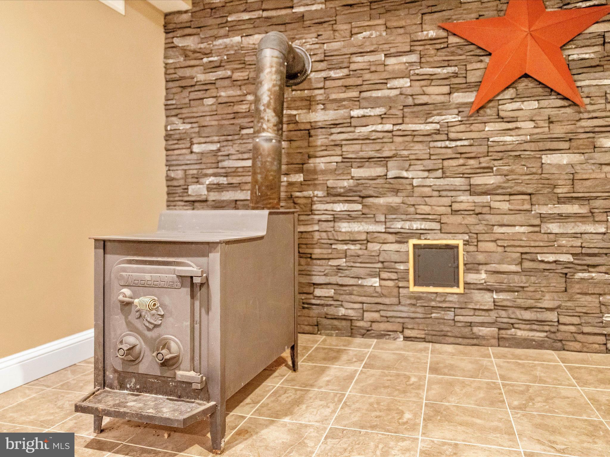 8429 Woodville Road Mount Airy, MD 21771 - Photo 36 of 75 Lower Level Stove Detail