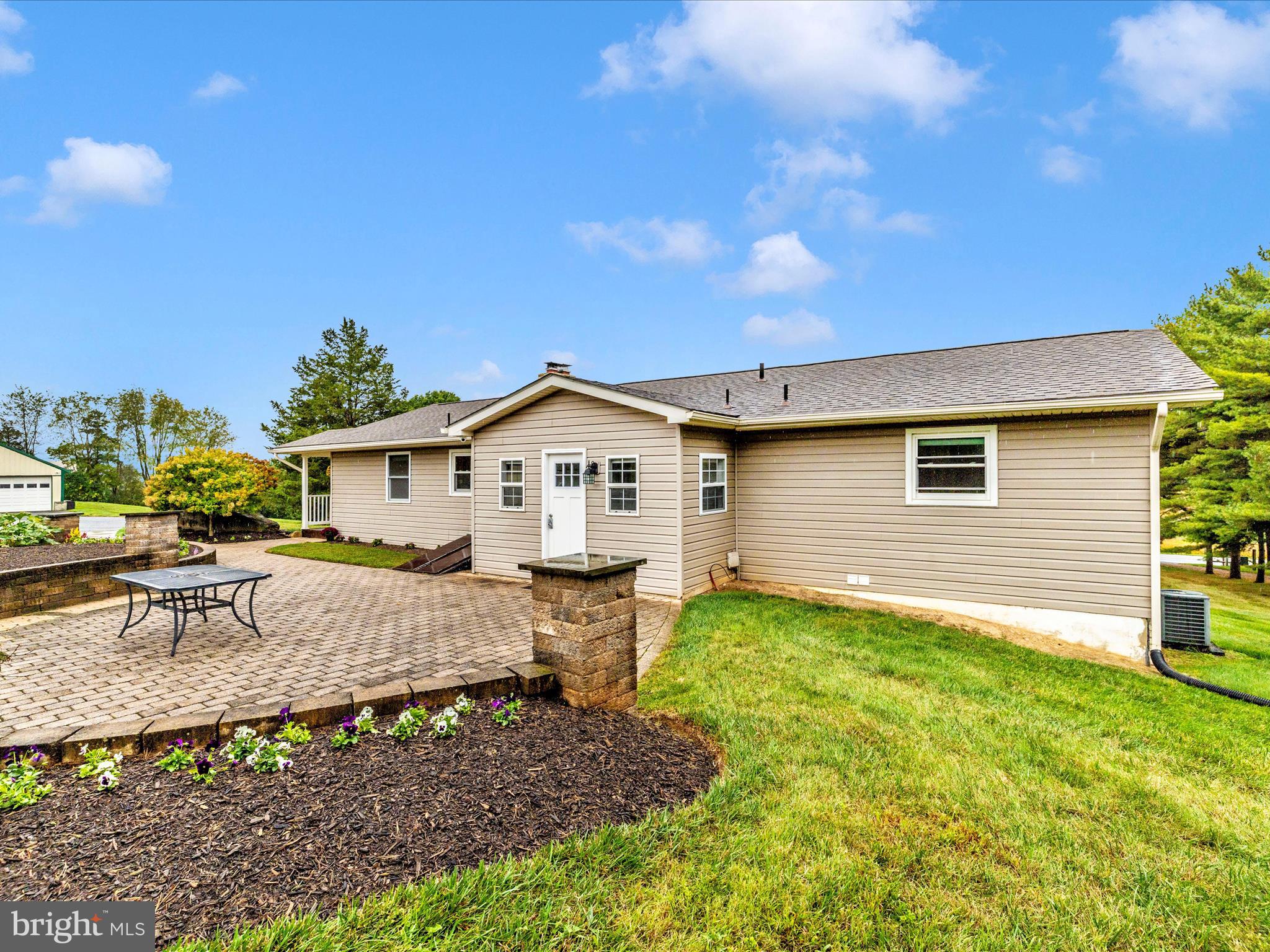 8429 Woodville Road Mount Airy, MD 21771 - Photo 47 of 75 a view of front of house with a yard