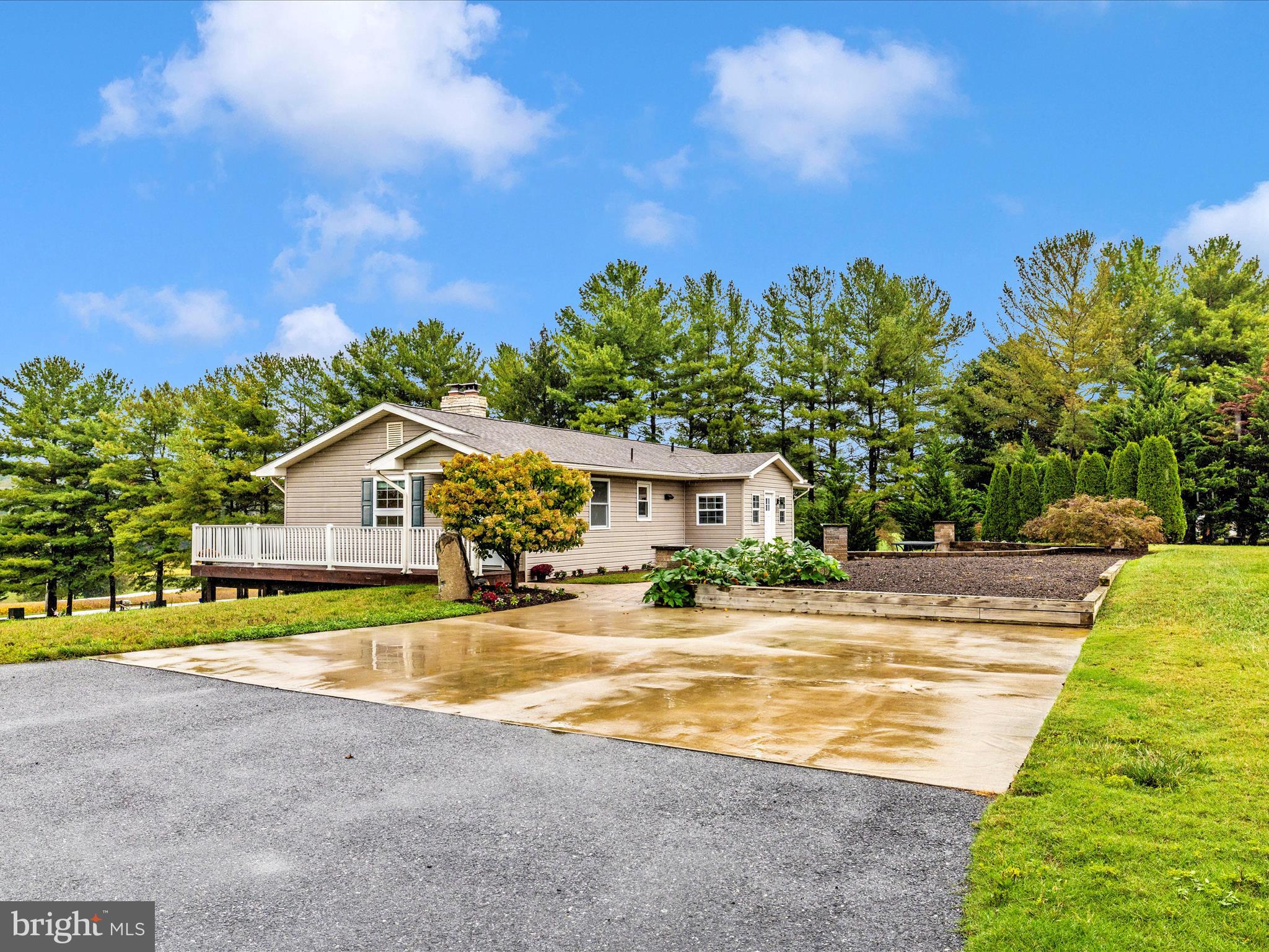 8429 Woodville Road Mount Airy, MD 21771 - Photo 59 of 75 a view of a house with swimming pool and a yard
