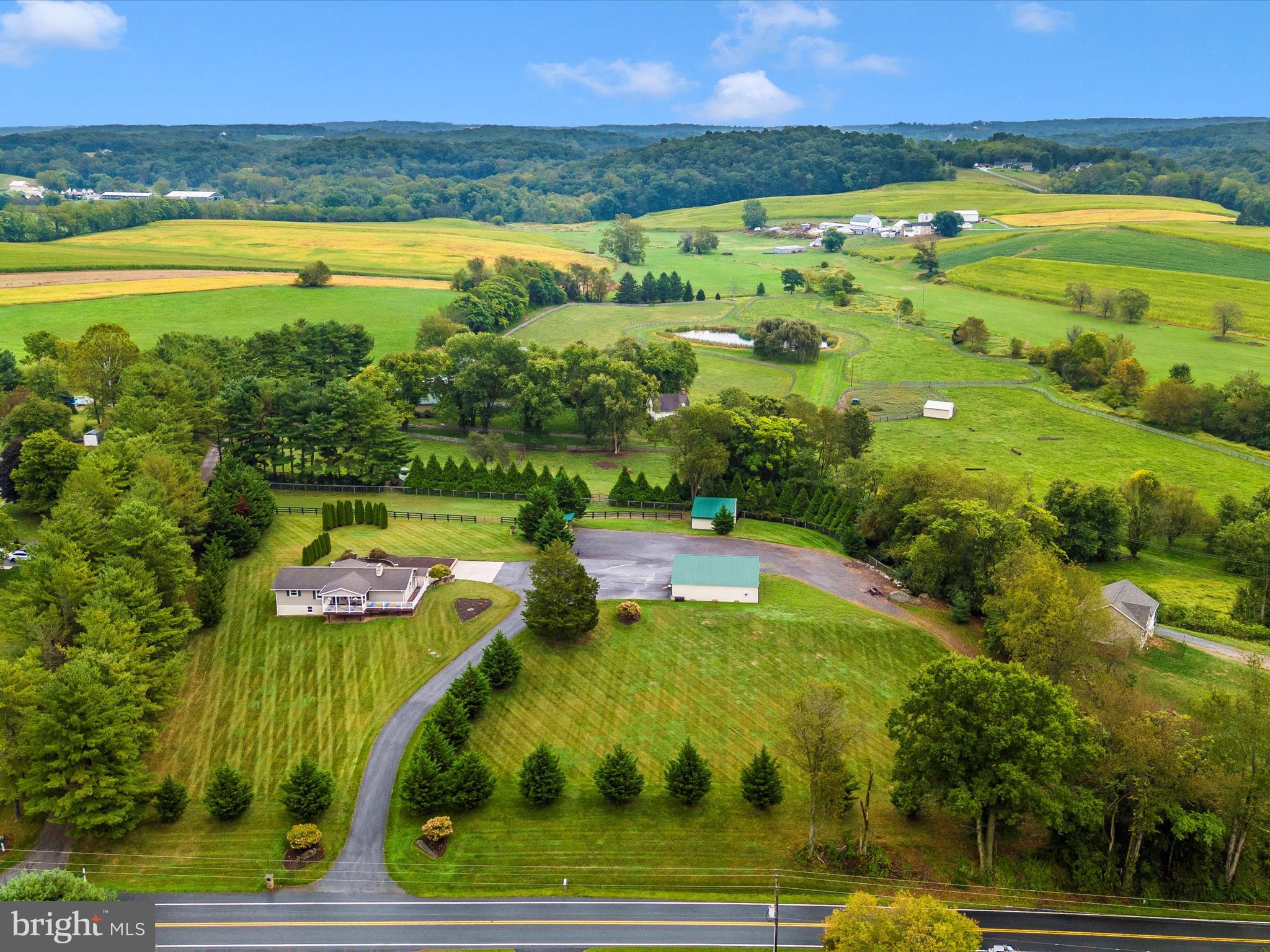 8429 Woodville Road Mount Airy, MD 21771 - Photo 60 of 75 a view of an swimming pool and a yard
